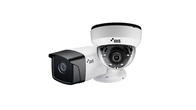 Front of zip tote bag with white canvas, black canvas straps and handle, and black zipper pulls.